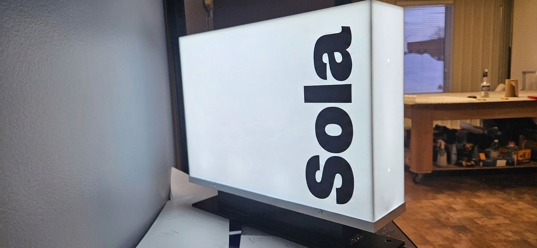 Illuminated cabinet sign
