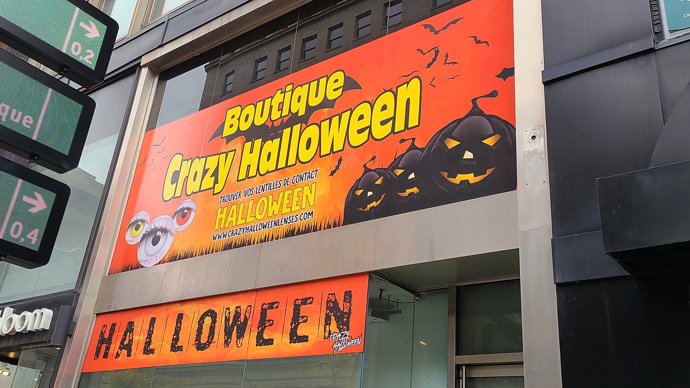 Printed large-format facade wrap installed on the street