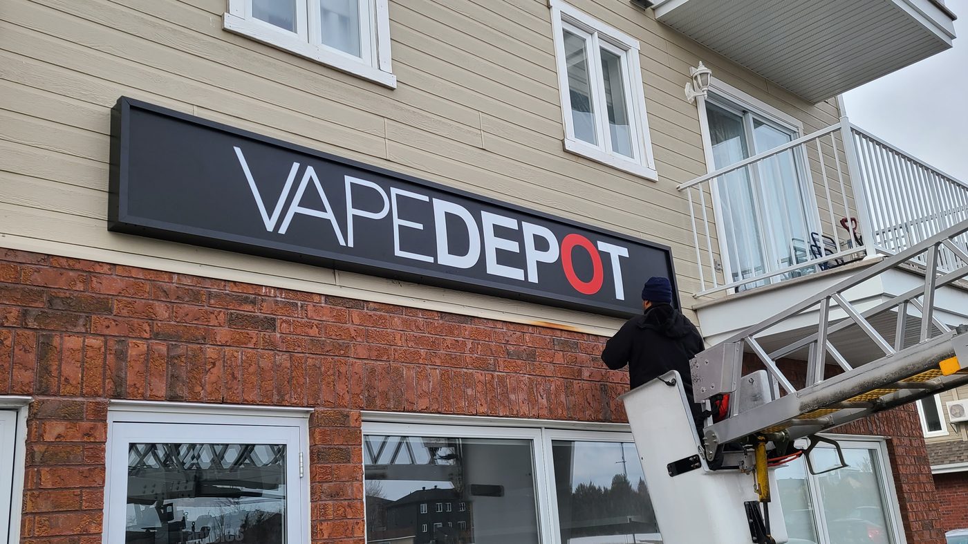 Installing an illuminated cabinet on a storefront